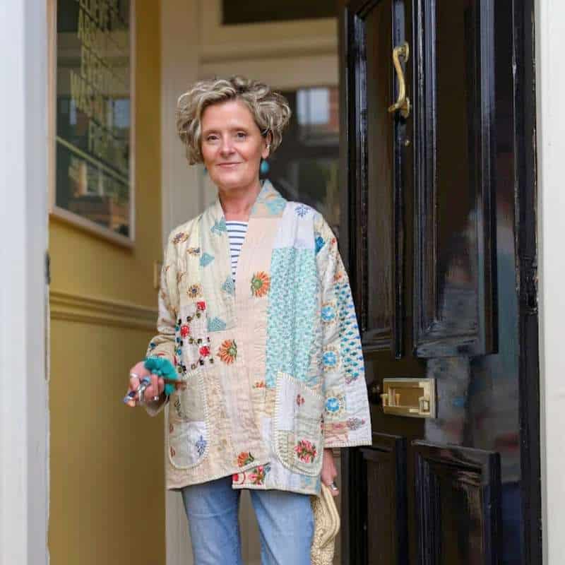 kate wearing a cream patchwork jacket