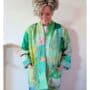 kate wearing a green patchwork kantha jacket