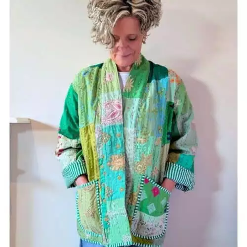 kate wearing a green patchwork kantha jacket